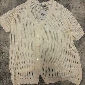 White open knit cardigan from Princess Polly. Perfect for beach day.
